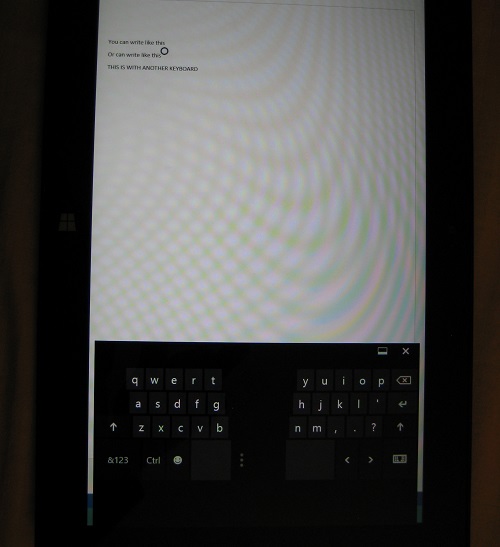Microsoft Surface RT showing thumb accessible on-screen keyboard in portrait mode