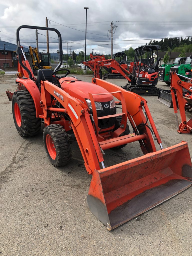 Kubota L2501 tractor with front loader and backhoe