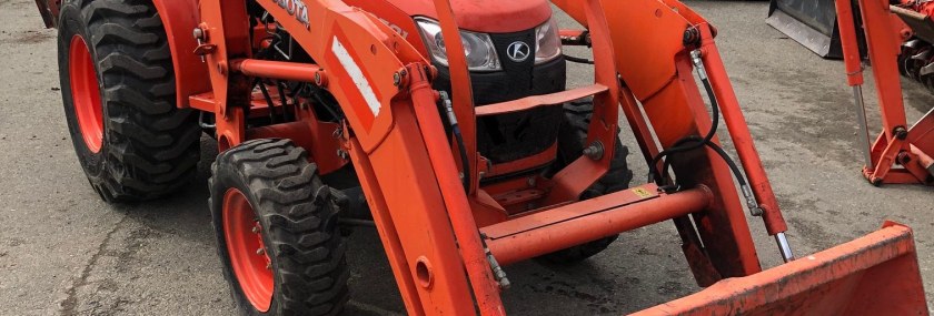 Kubota L2501 tractor with front loader and backhoe